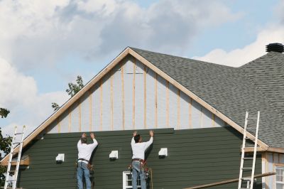 Fiber Cement Siding Being Installed